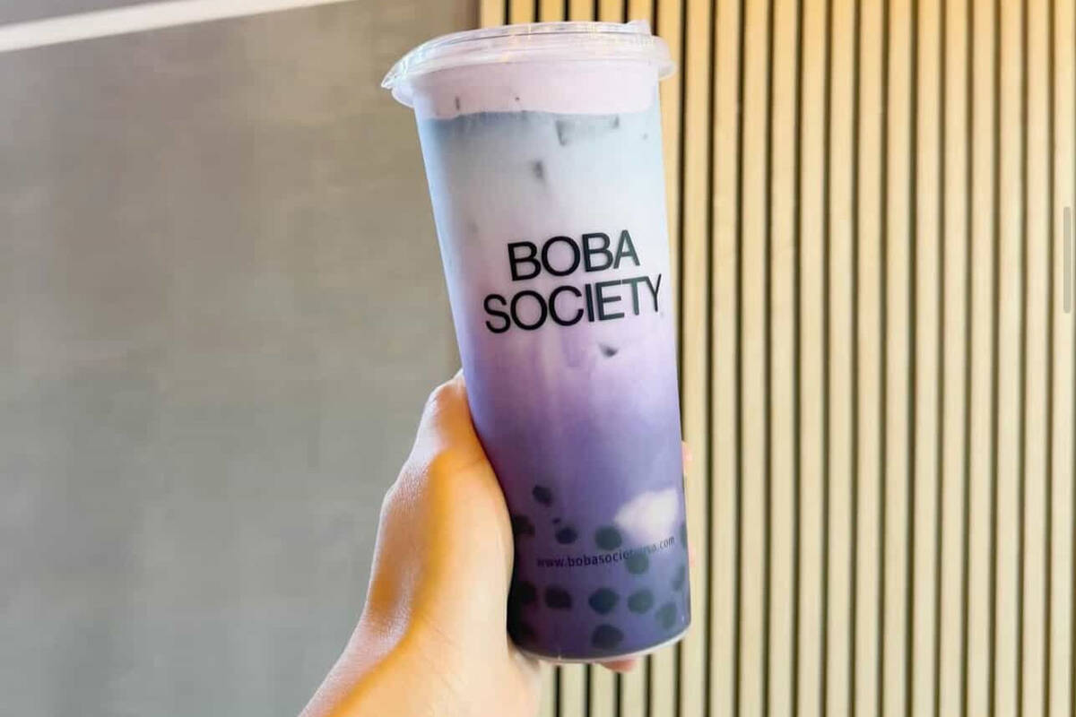Taro Ocean is a taro latte with butterfly pea tea and milk, topped with ube taro foam. (Boba So ...