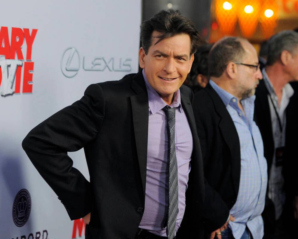 Charlie Sheen poses at a film premiere on April 11, 2013, in Los Angeles. (Chris Pizzello/Invis ...