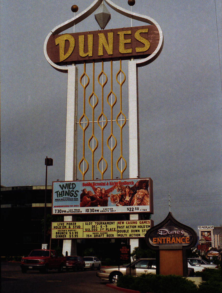 The original entrance sign at Dunes Hotel is shown at lower right. The sign will be on display ...