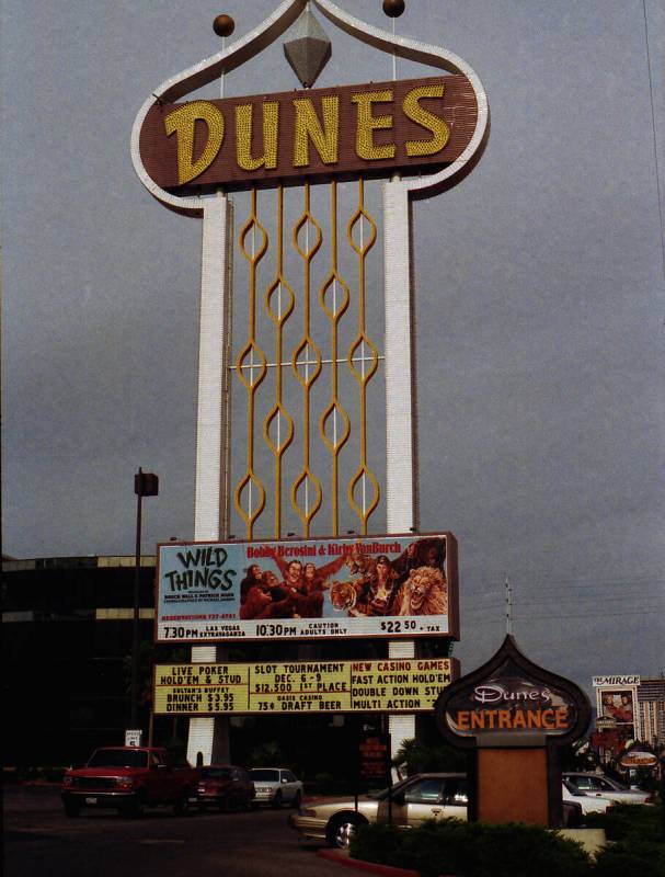 The original entrance sign at Dunes Hotel is shown at lower right. The sign will be on display ...