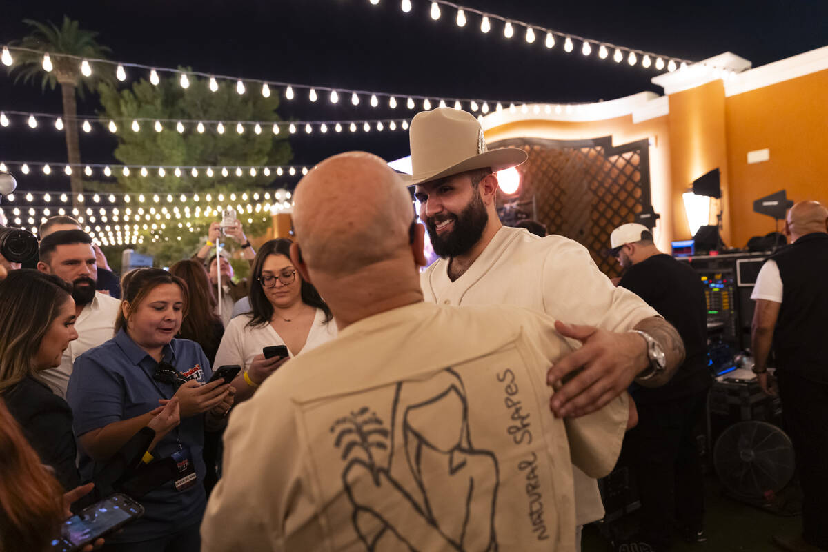Mexican star Carin León greets supporters and friends following the announcement for his c ...
