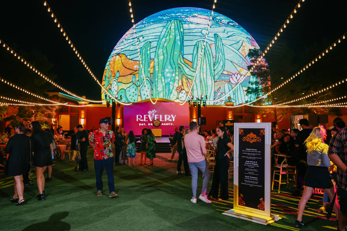 Guests socialize on the lawn during Revelry’s The Feast on Saturday, Sept. 20, 2025 at t ...
