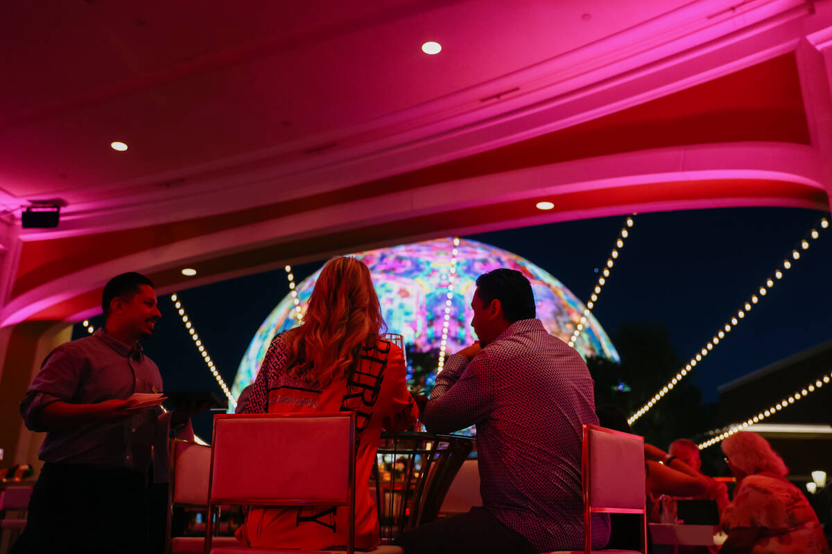 Guests sit at tables and snack during Revelry’s The Feast on Saturday, Sept. 20, 2025 at ...