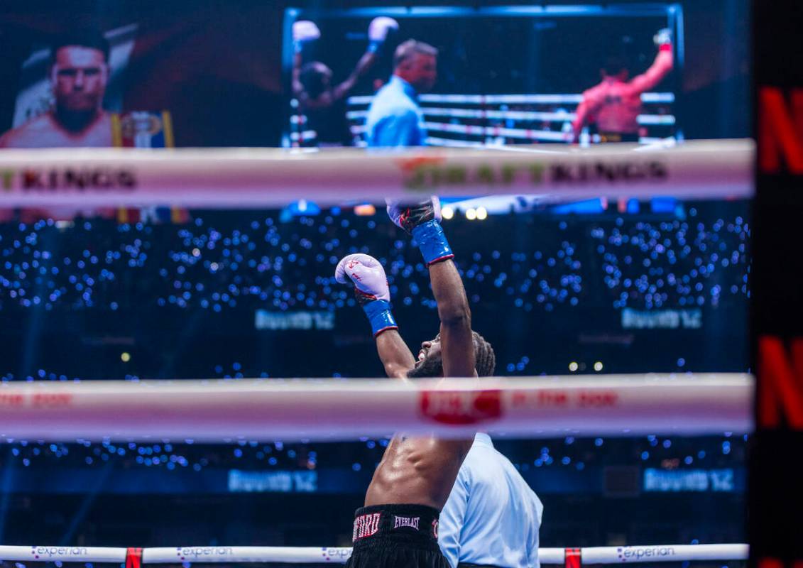 Terence Crawford celebrates his win over Canelo Alvarez during their undisputed super middlewei ...