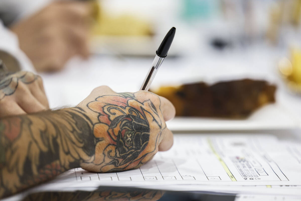 Judger and pastry chef Marco Lusso makes notes while judging the Panettone World Cup at the Int ...