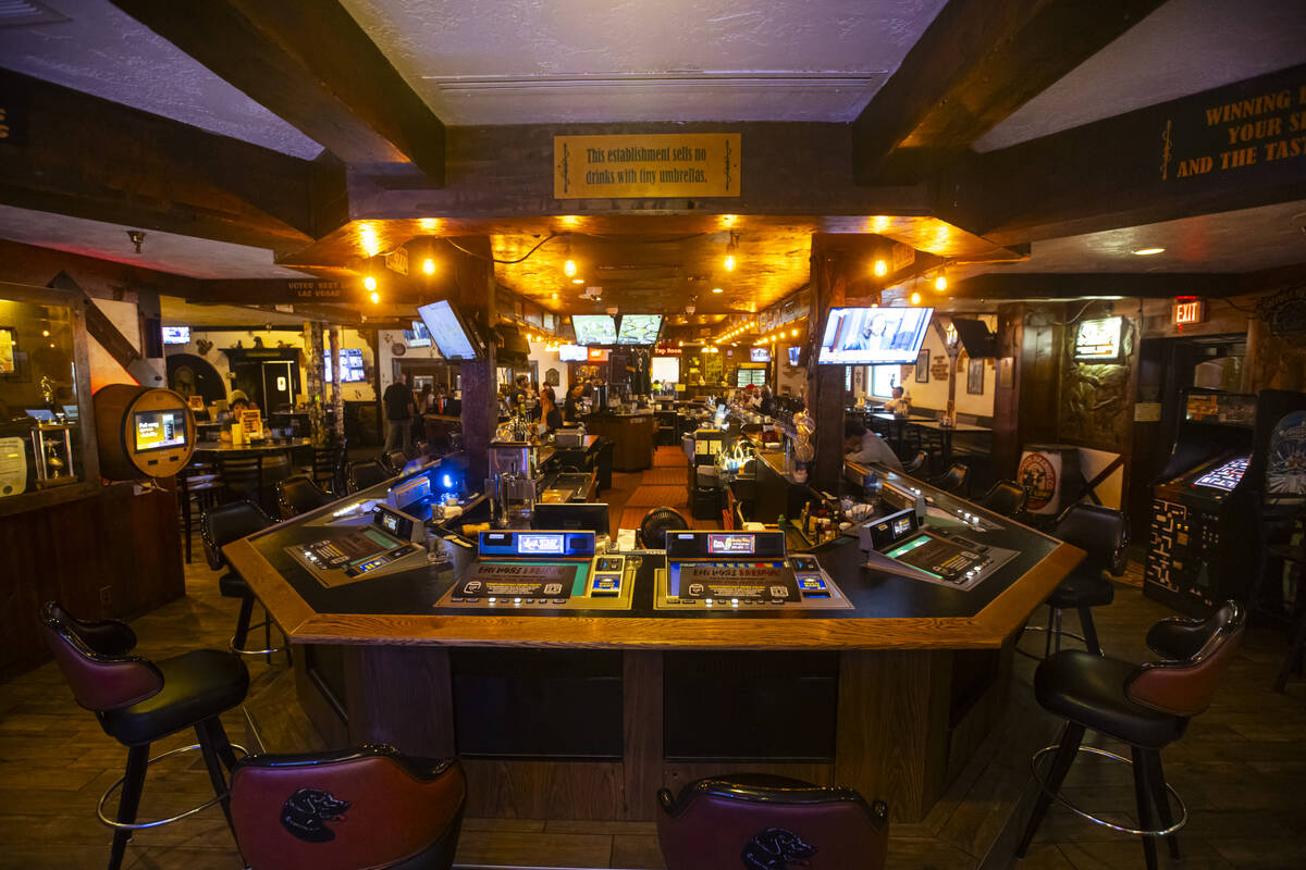 A bar area with tabletop gaming is seen at Big Dog’s Draft House, at 4543 N. Rancho Drive, on ...