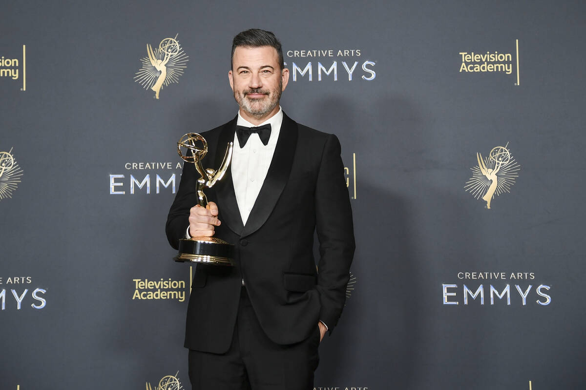 Jimmy Kimmel poses in the press room with the award for host for a game show for "Who Want ...