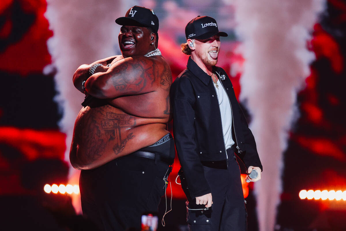 BigXthaPlug, left, performs with Bailey Zimmerman during night one of the iHeartRadio Music Fes ...