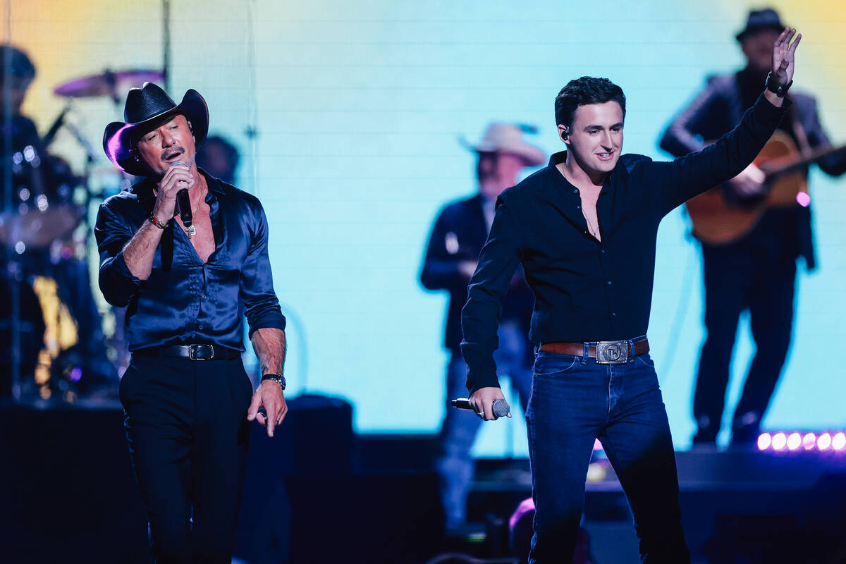Tim McGraw performs with his nephew, Timothy Wayne, during night two of the iHeartRadio Music F ...