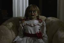 This photo released by Warner Bros. Pictures shows the Annabelle doll in a scene from New Line ...