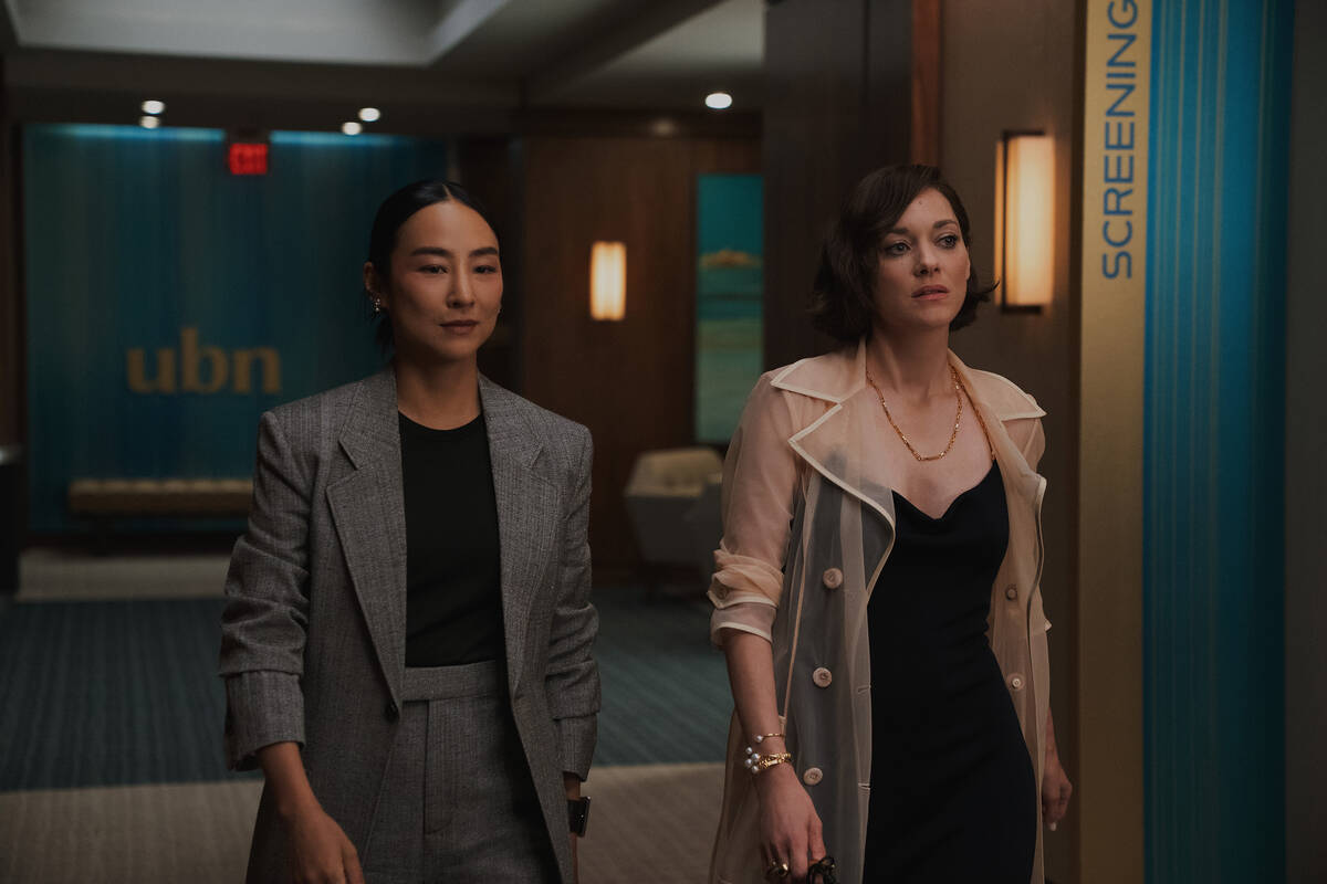 Greta Lee, left, and Marion Cotillard in "The Morning Show," now streaming on Apple T ...