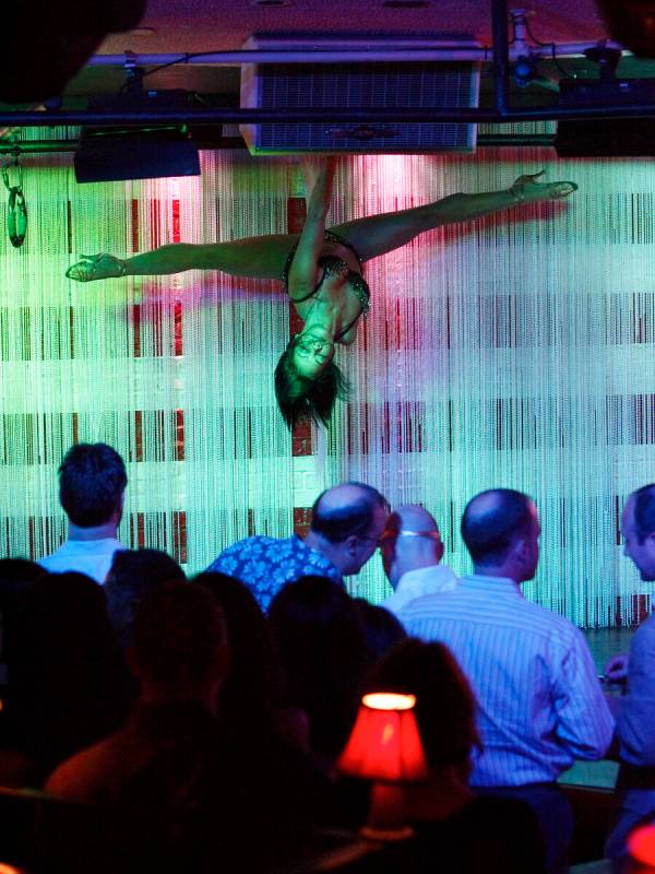 Burlesque dancer Carolyn Pace performs on stage during show at Ivan Kane's Forty Deuce Nightclu ...