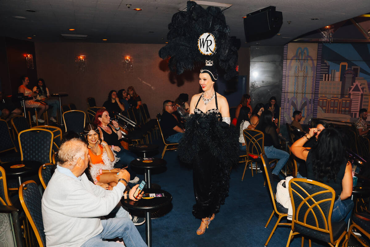 Kristina Schiavi, a showgirl, greets swifties during a listening party for Taylor Swift’ ...