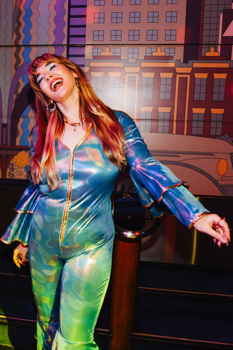 Caitlen Todd dances during a listening party for Taylor Swift’s new album “The Li ...