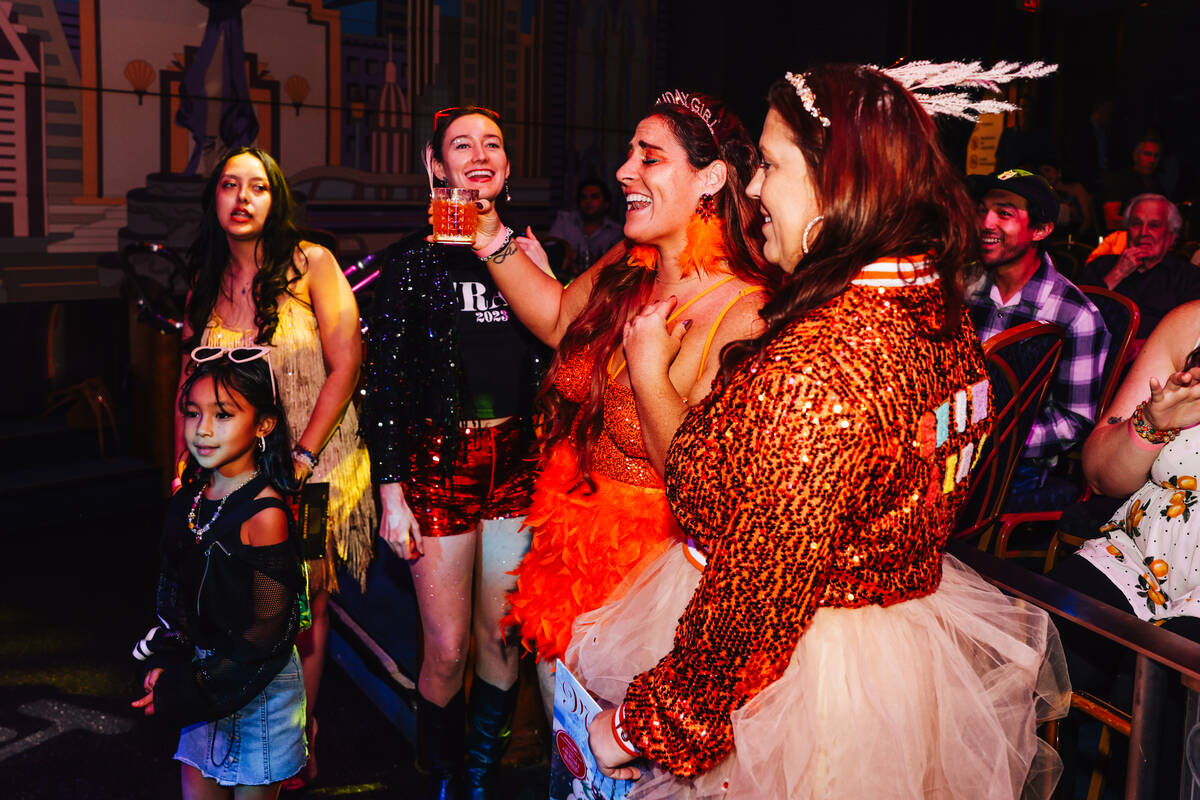 Swifties sing along and dance during a listening party for Taylor Swift’s new album &#x2 ...