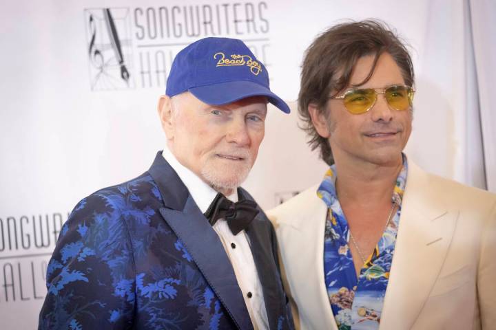 Mike Love, left, and John Stamos attend the 54th Annual Songwriters Hall of Fame Induction and ...