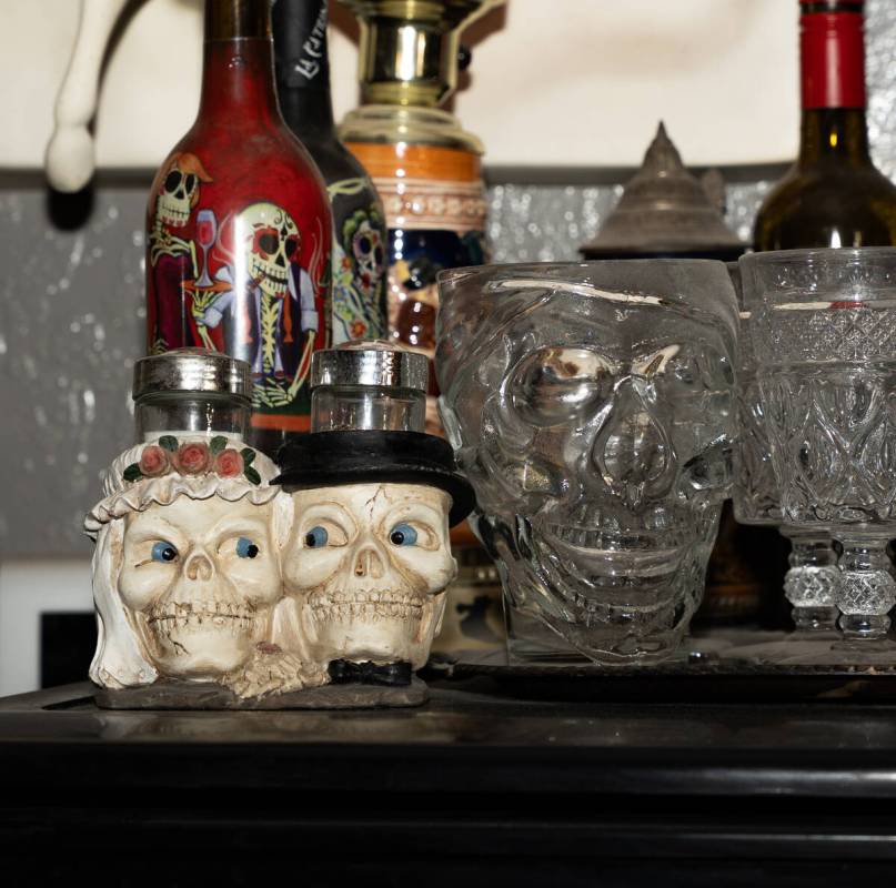 Skull themed glasses sit in the kitchen of Skull Manor, a year-round Halloween-themed home in L ...