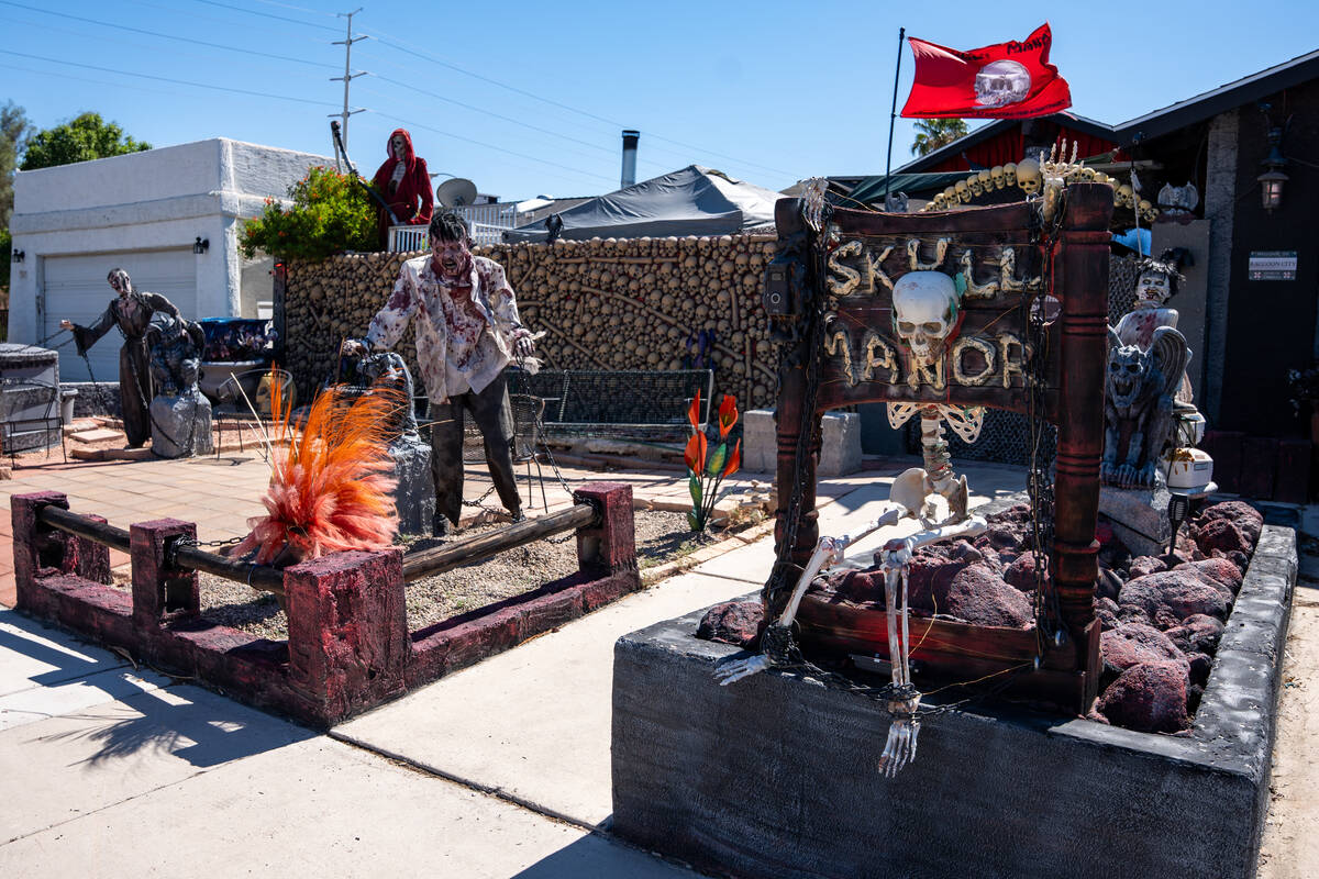 The front yard of Skull Manor, a year-round Halloween-themed house in Las Vegas Sept. 23, 2025. ...