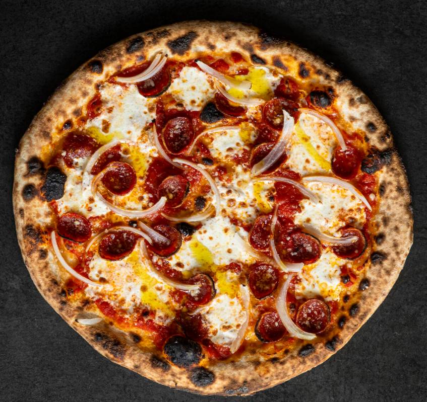 A Classic Pepperoni and Onion Pizza from How Ya Dough'n, a viral pizzeria set to open in Novemb ...