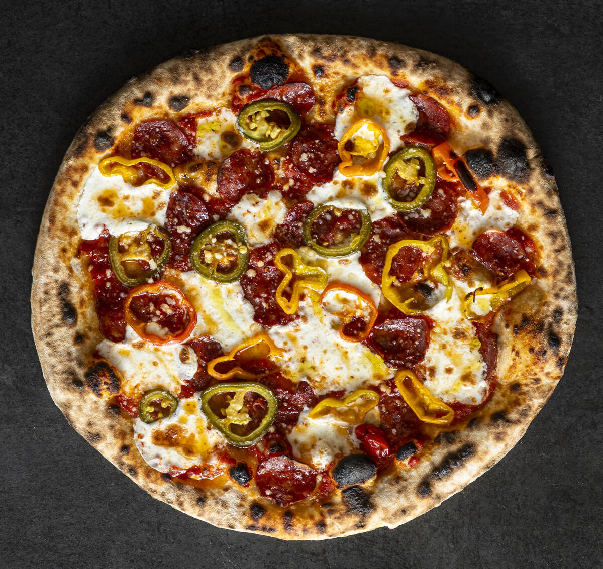 A Hot Mozz Pizza from How Ya Dough'n, a viral pizzeria set to open in November 2025 at the BLVD ...