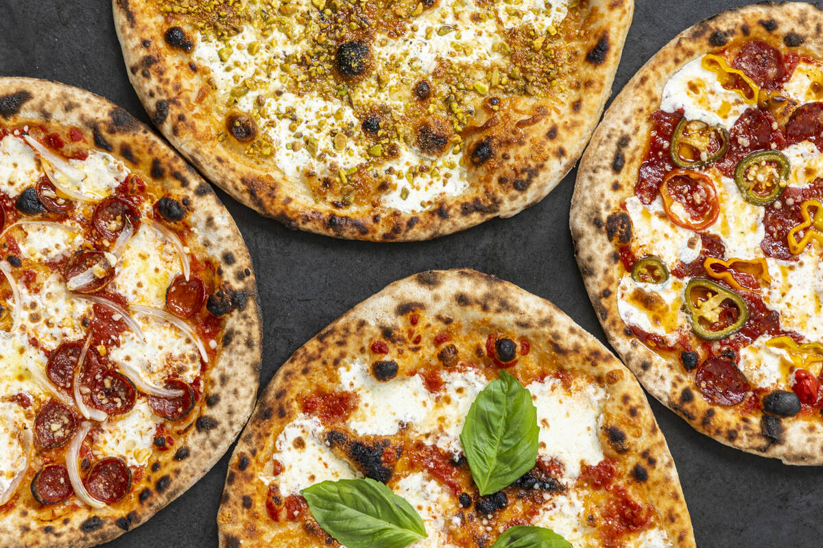 A spread of pizzas from How Ya Dough'n, a viral pizzeria set to open in November 2025 at t ...