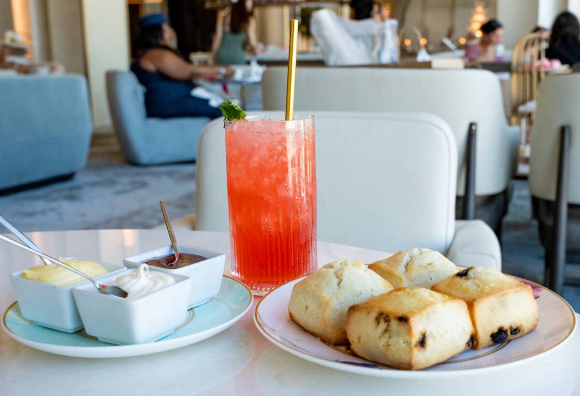 Warm plain and blueberry scones with assorted spreads, along with the “Hot Pink” ...