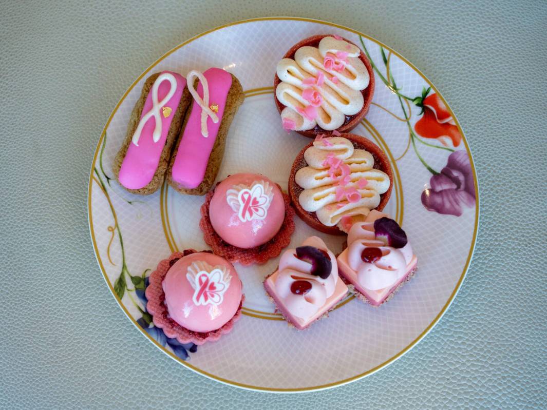 Clockwise from lower left: blood orange cheesecake domes, pomegranate éclairs, strawberry guav ...