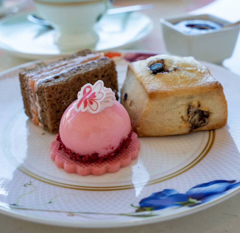 Clockwise from lower left: blood orange cheesecake dome, smoked salmon sandwich and blueberry s ...
