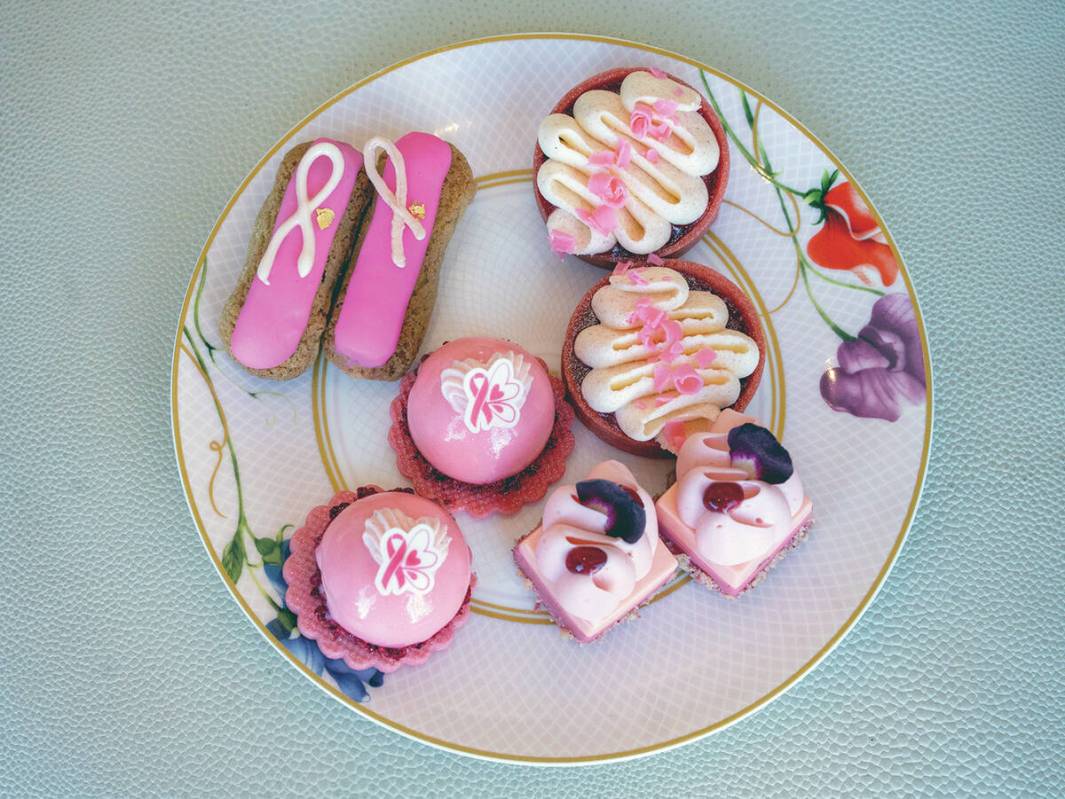 A blood orange cheesecake (upper left), pomegranate éclair (upper right), spice cake (bott ...