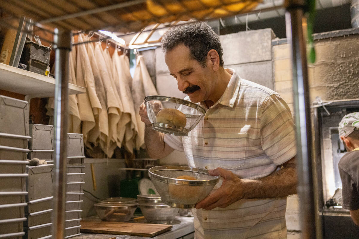 This image released by CNN shows Tony Shalhoub in a scene from his series "Breaking Bread, ...