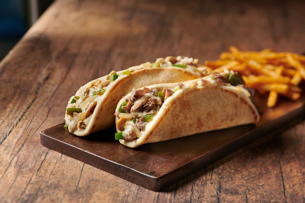 Classic Philly Cheesesteak Pita and Philly Chicken Cheesesteak Pita, with fries, from Miami Gri ...