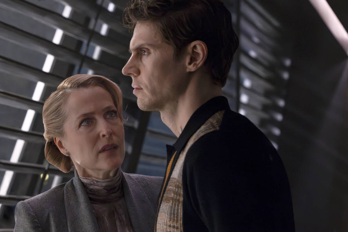 This image released by Disney shows Gillian Anderson, left, and Evan Peters in a scene from &qu ...
