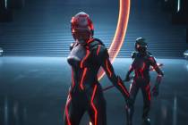 This image released by Disney shows Jodie Turner-Smith, center, in a scene from "Tron: Are ...