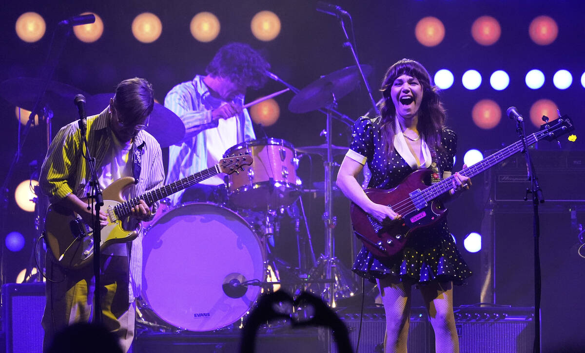 From left, Blake Sennett, Jason Boesel and Jenny Lewis of Rilo Kiley perform during the Just Li ...