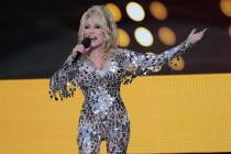 Host Dolly Parton speaks at the 57th Academy of Country Music Awards on Monday, March 7, 2022, ...