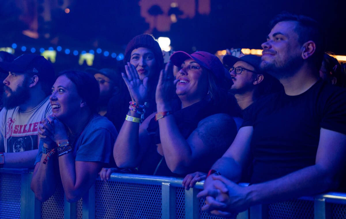 Fans cheer as Minus the Bear, Friday night’s headlining band, takes the stage during Bes ...