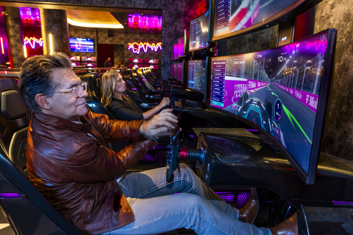 John Katsilometes gives simulated racing a try on the Las Vegas track as the F1 Las Vegas Arcad ...