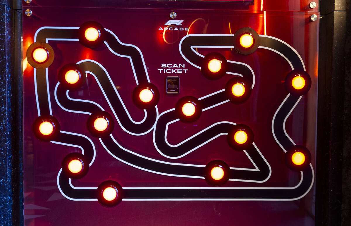 A button slapping game is some of the fun at the F1 Las Vegas Arcade which will open next week ...