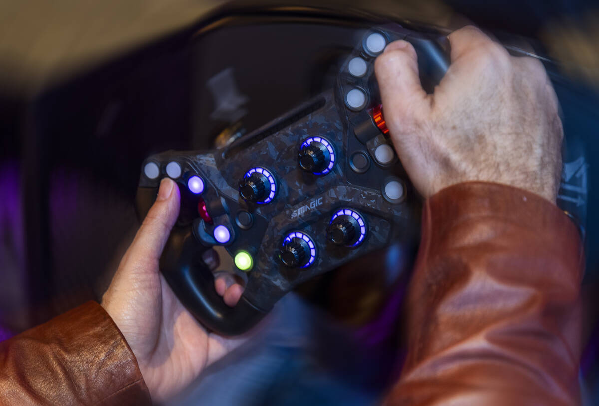John Katsilometes gives simulated racing a try on the Las Vegas track as the F1 Las Vegas Arcad ...