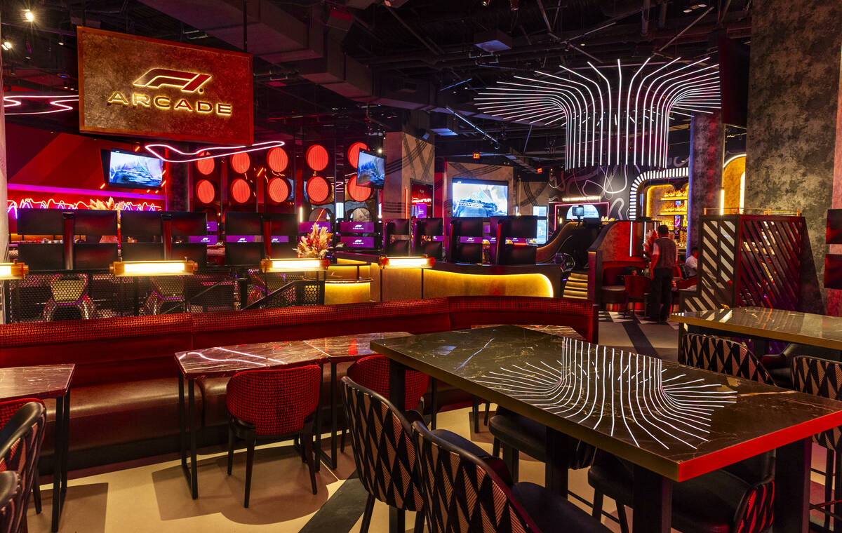 Seating for one of the bars and dining are about some of the many driving simulators about F1 L ...