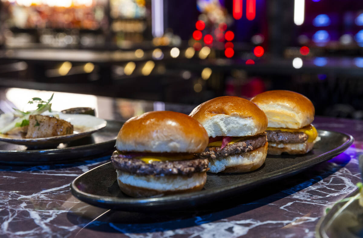 Wagyu Beef Sliders with smoked aged cheddar, horseradish and pickled red onion available at the ...