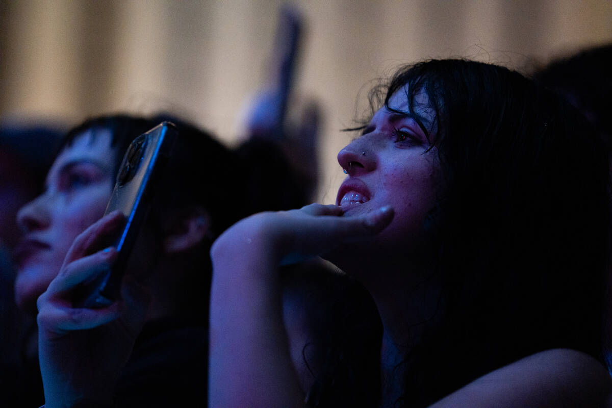 Fans watch the indie rock band Cursive performs on the main stage at Best Friends Forever Fest ...