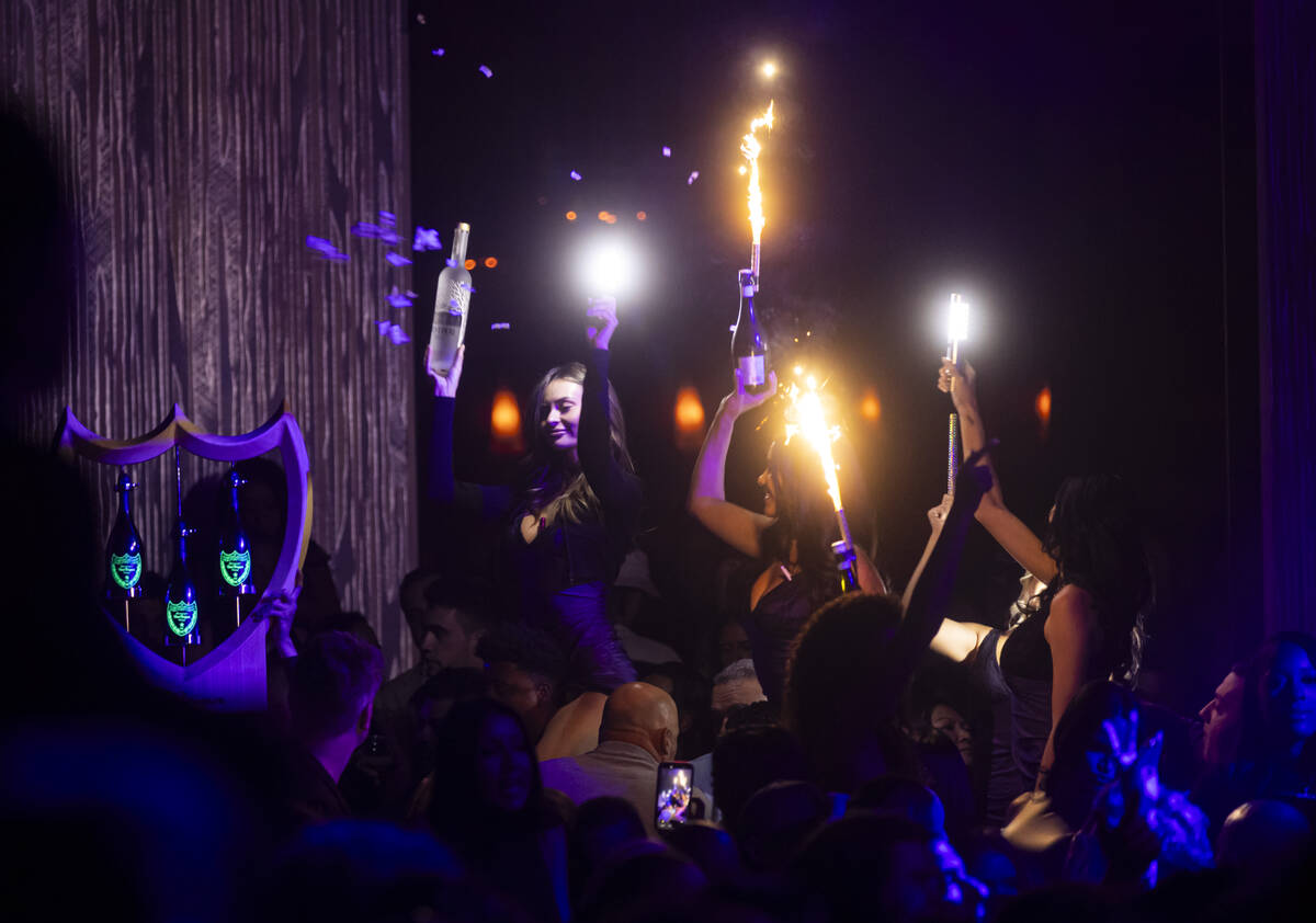 Bottle service moves through the crowd at Marquee Nightclub at The Cosmopolitan on Tuesday, Oct ...