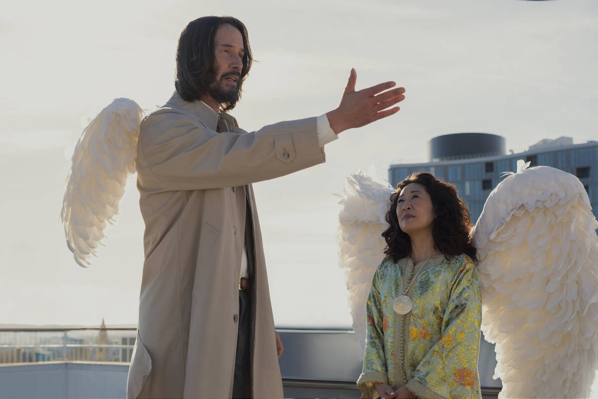 Keanu Reeves as Gabriel and Sandra Oh as Martha in "Good Fortune." (Eddy Chen)