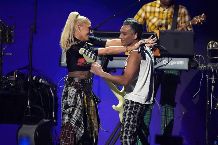 Gwen Stefani, left, and Tony Kanal of No Doubt perform during the FireAid benefit concert on Th ...
