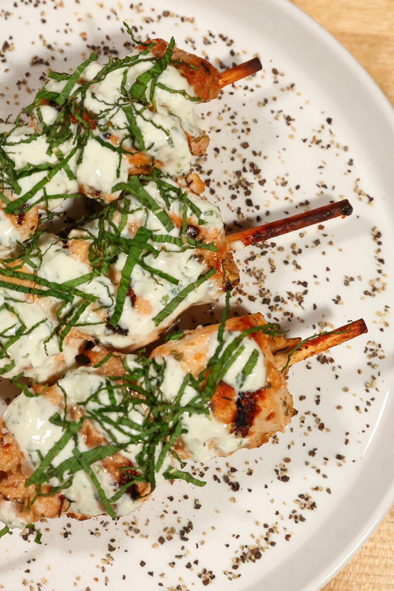 The grilled Mediterranean chicken skewers with tzatziki sauce at Echo Taste & Sound in the Arts ...
