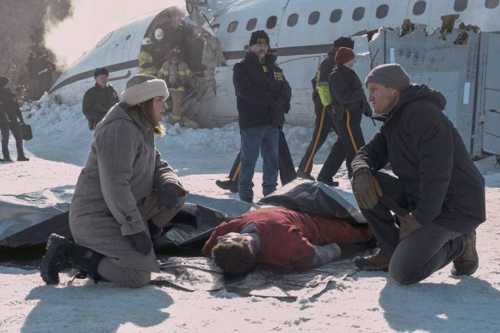 This image released by Apple TV+ shows Haley Bennett, left, and Jason Clarke in a scene from &q ...