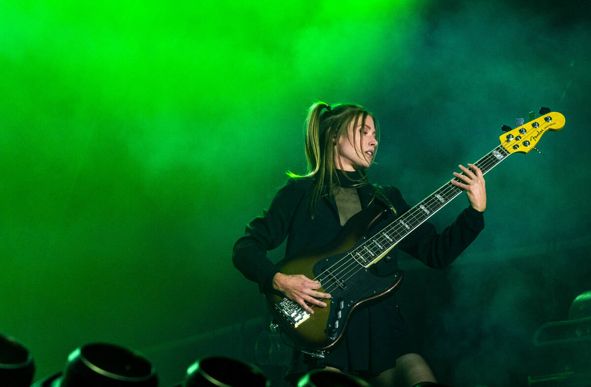 Bass guitarist Nicole Row with Panic! At The Disco performs with the band on the 7-Eleven stage ...