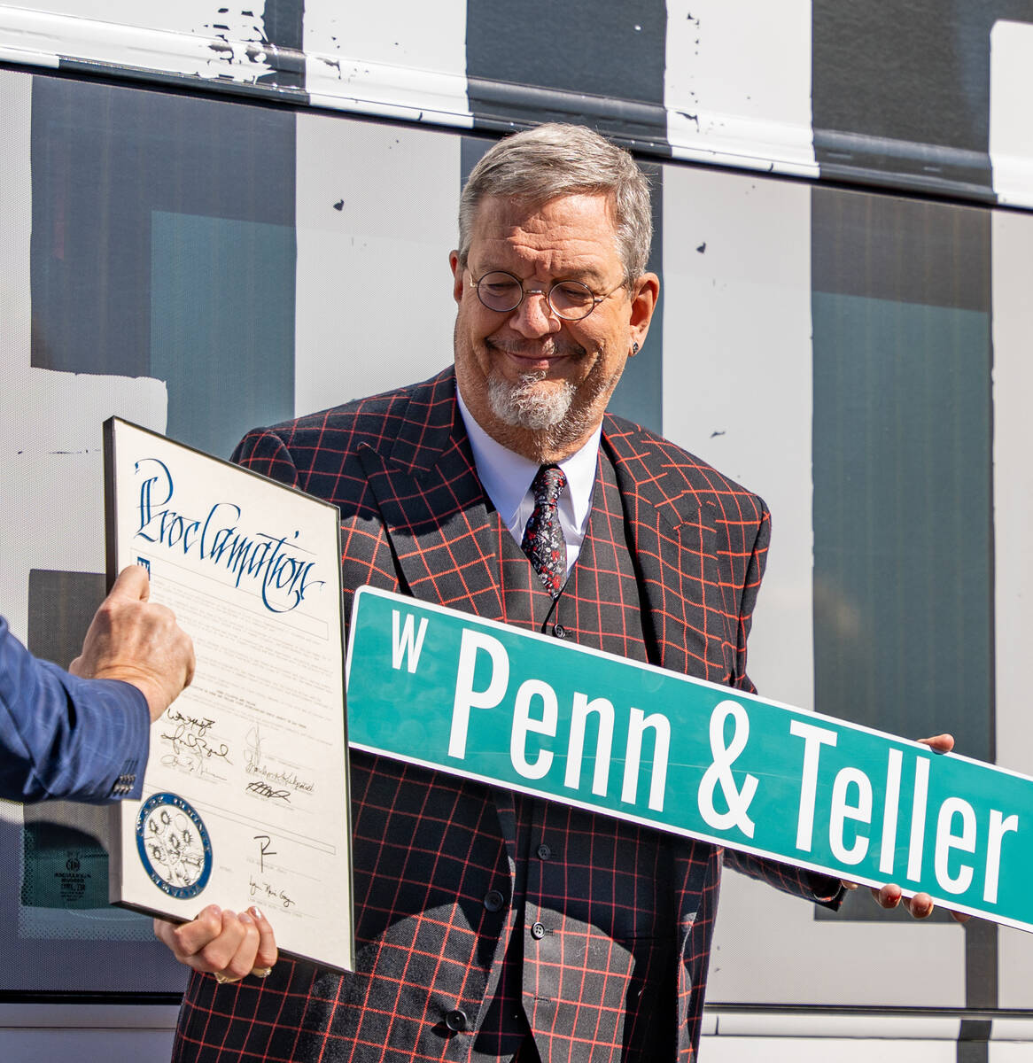 Penn receives a proclamation from the city of Las Vegas during a street renaming event at the R ...