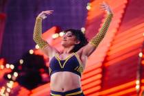 Lil J-Boogie pumps up the crowd in a WOW Wrestling match on Fremont Street Wednesday, Oct. 22, ...